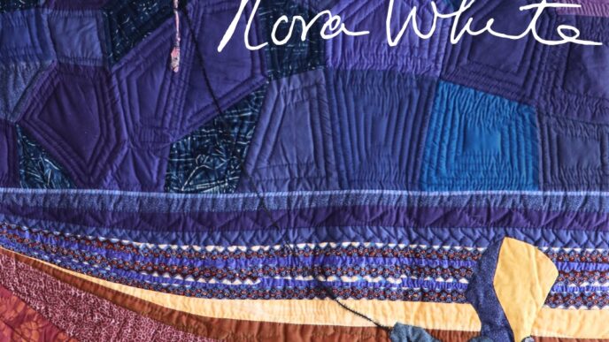 Poster announcing the Nora White exhibit: quilted artwork with navy, purple, and red patches; opening April 23, 2026 at 5:00 PM. Logos of Baja California Sur government and museums appear at top.