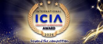Gold laurel wreath surrounding a blue 'ICIA' logo with 'Award 2026' and red 'Creativity & Innovation' text; radiant background and 'beyond the competition' banner at the bottom.