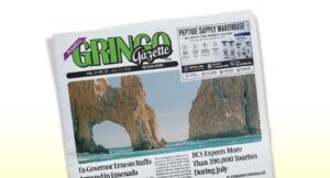 Front page of a newspaper titled Gringo Gazette, featuring a coastal rock arch photo.