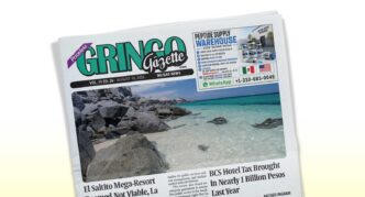 Front page of Gringo Gazette newspaper tilted at an angle, featuring a tropical beach photo and bold headlines.