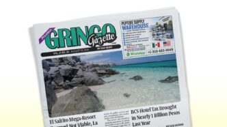 Front page of Gringo Gazette newspaper tilted at an angle, featuring a tropical beach photo and bold headlines.