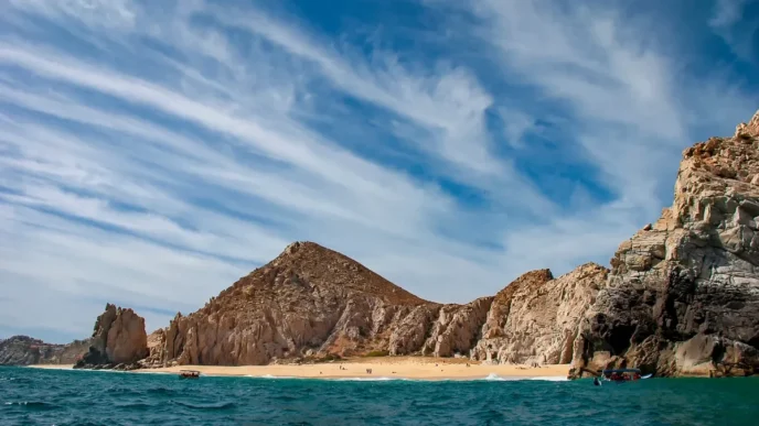 Navy Rescues Two Americans Trapped by Surf at Divorce Beach