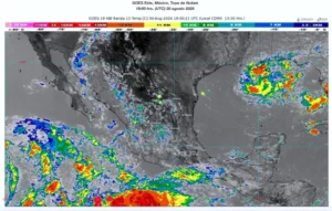 GOES weather map over Mexico and surrounding seas showing cloud cover and precipitation; strong storms in the Gulf of Mexico and off the Pacific coast. Timestamp 30 Aug 2026 19:00 UTC.