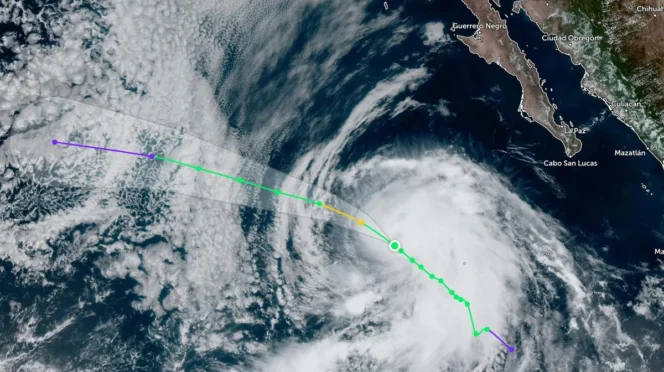 Satellite image of a hurricane off the western Mexican coast near Baja California, with the storm’s eye and spiral clouds visible and a colored forecast track overlay in purple, yellow, and green lines. Alternate: Storm with clear eye approaching Mexico’s Pacific coast; forecast path shown by multi-color lines.