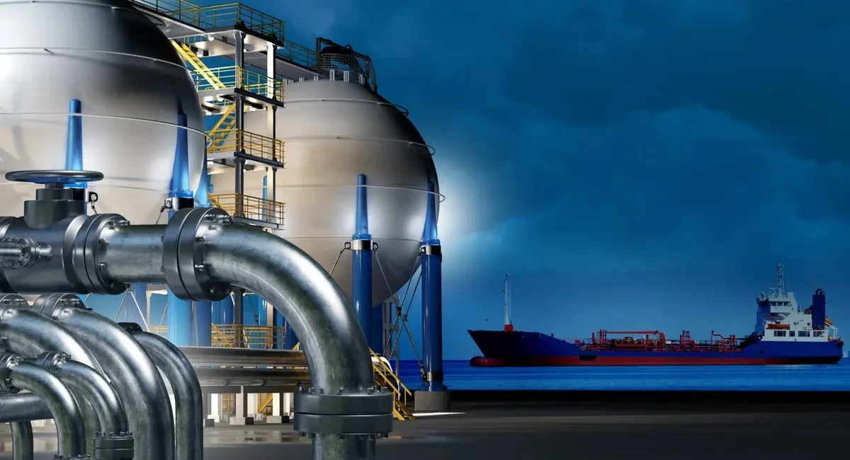 Industrial facility with large spherical storage tanks and extensive piping beside a dock.