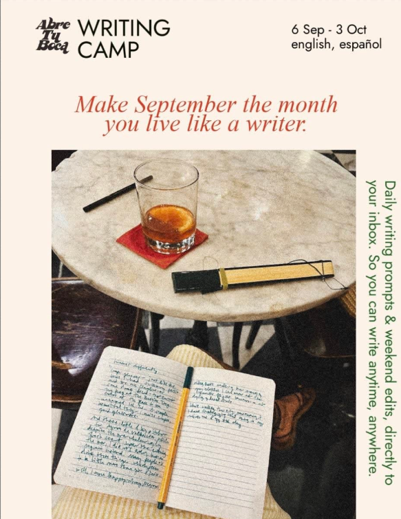 Advertisement for Abre Tu Boca Writing Camp showing a notebook open to handwritten pages, a glass on a red coaster, and a marble table with a bookmark, promoting 'Make September the month you live like a writer.'