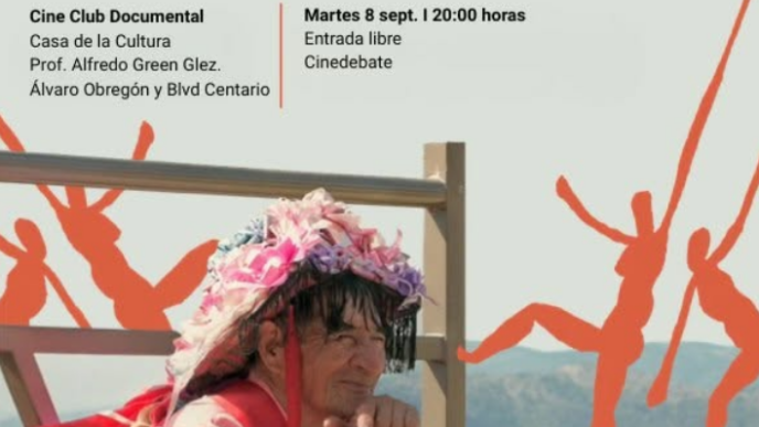 Poster for the documentary 'Los que dicen ¡no!' with event details and logos; a man in a pink outfit wearing a flowered headdress leaning on a wooden frame against a light background with orange silhouette figures nearby.